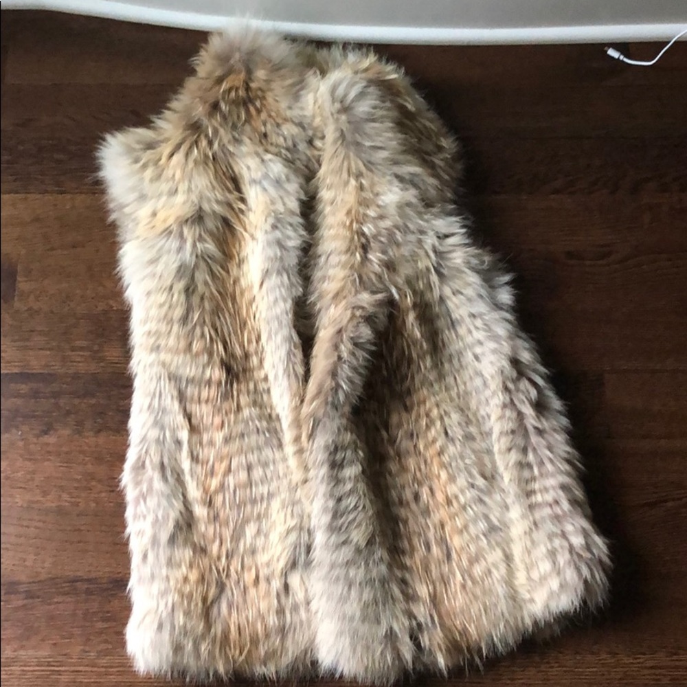 Vince fur vest.